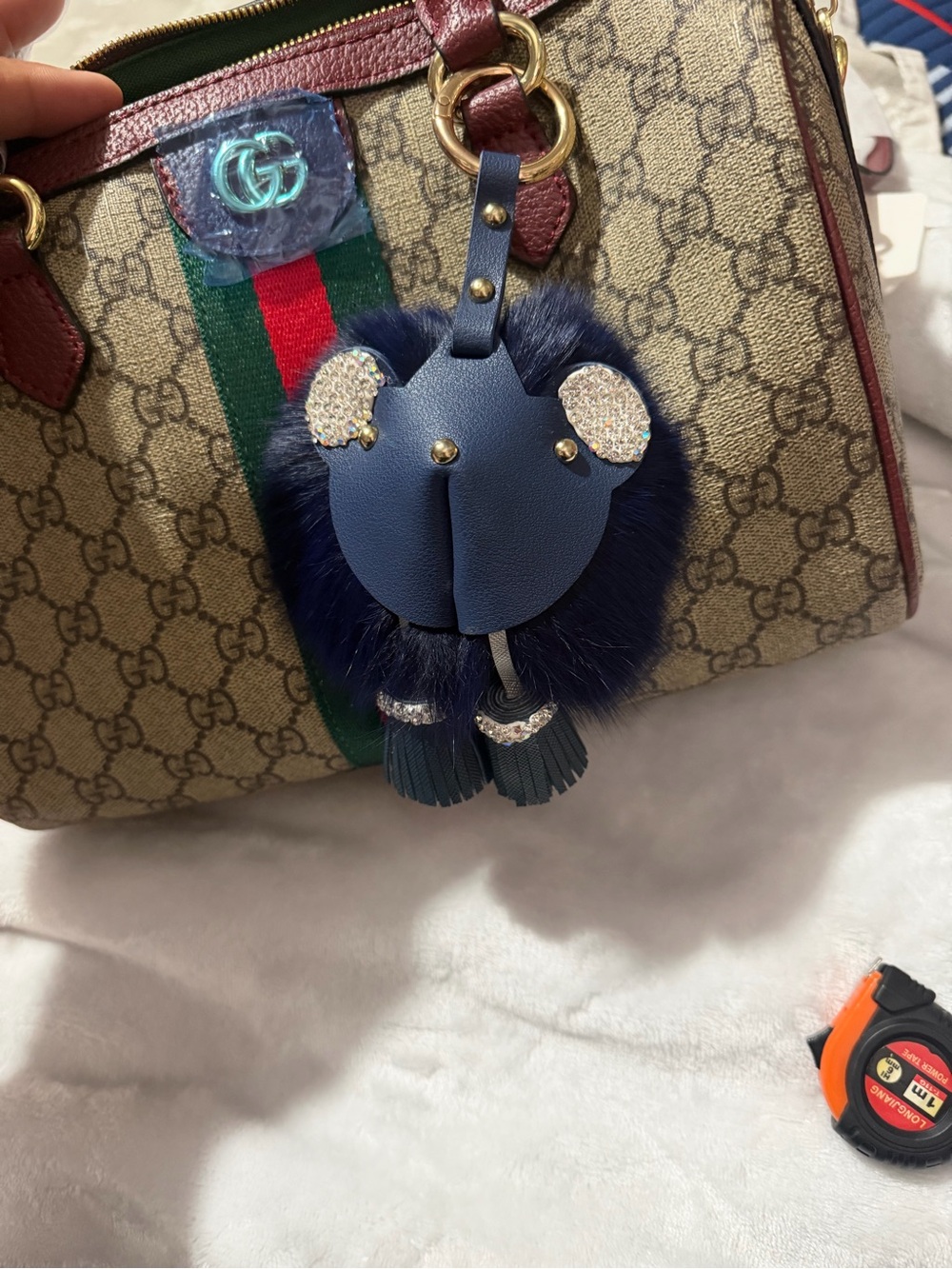Inspired Navy Blue Plushy Bag Charm with Rainbow Rhinestones Accents